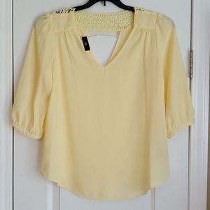 Pale Yellow blouse with cut out detail